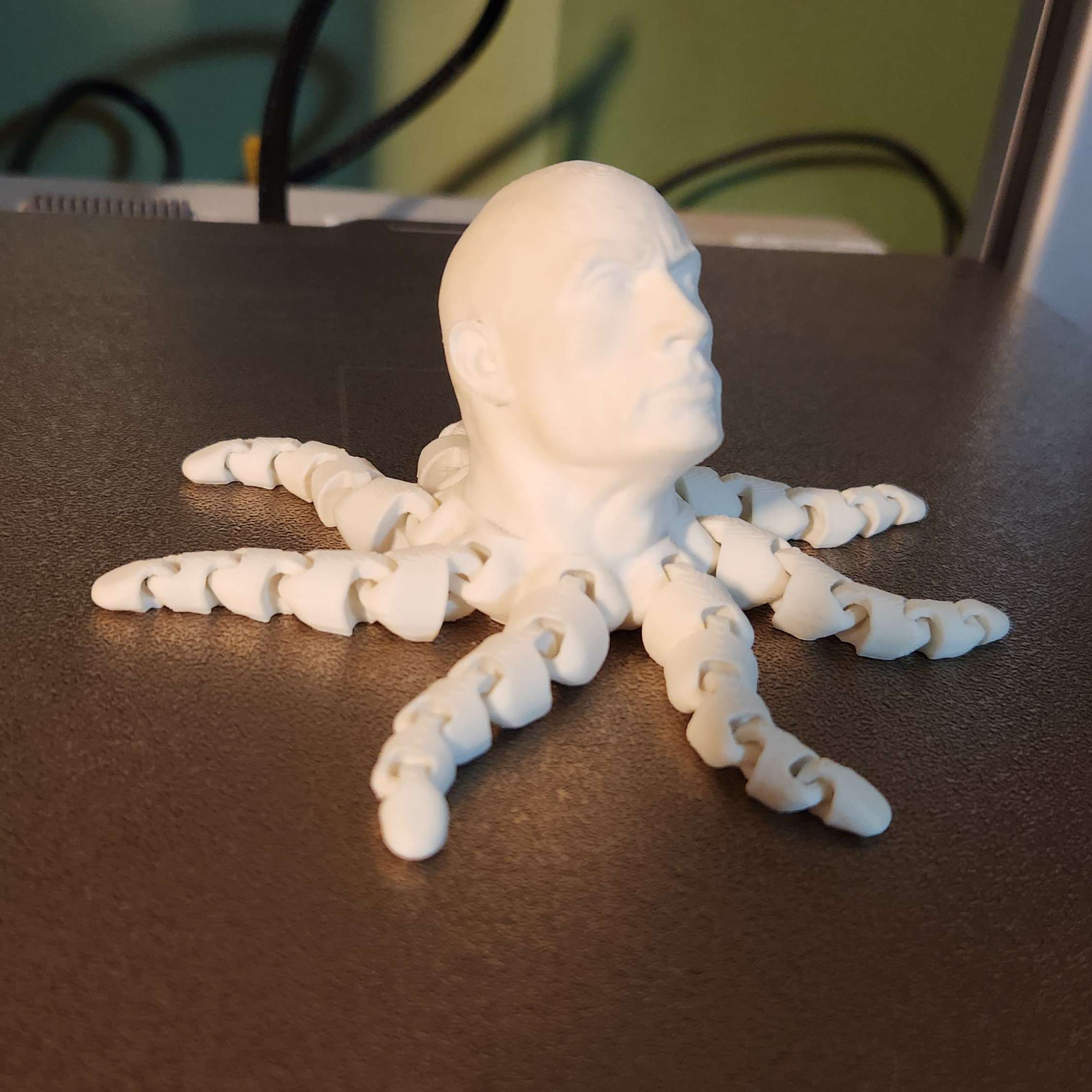dwayne johnson's head on the body of an octopus