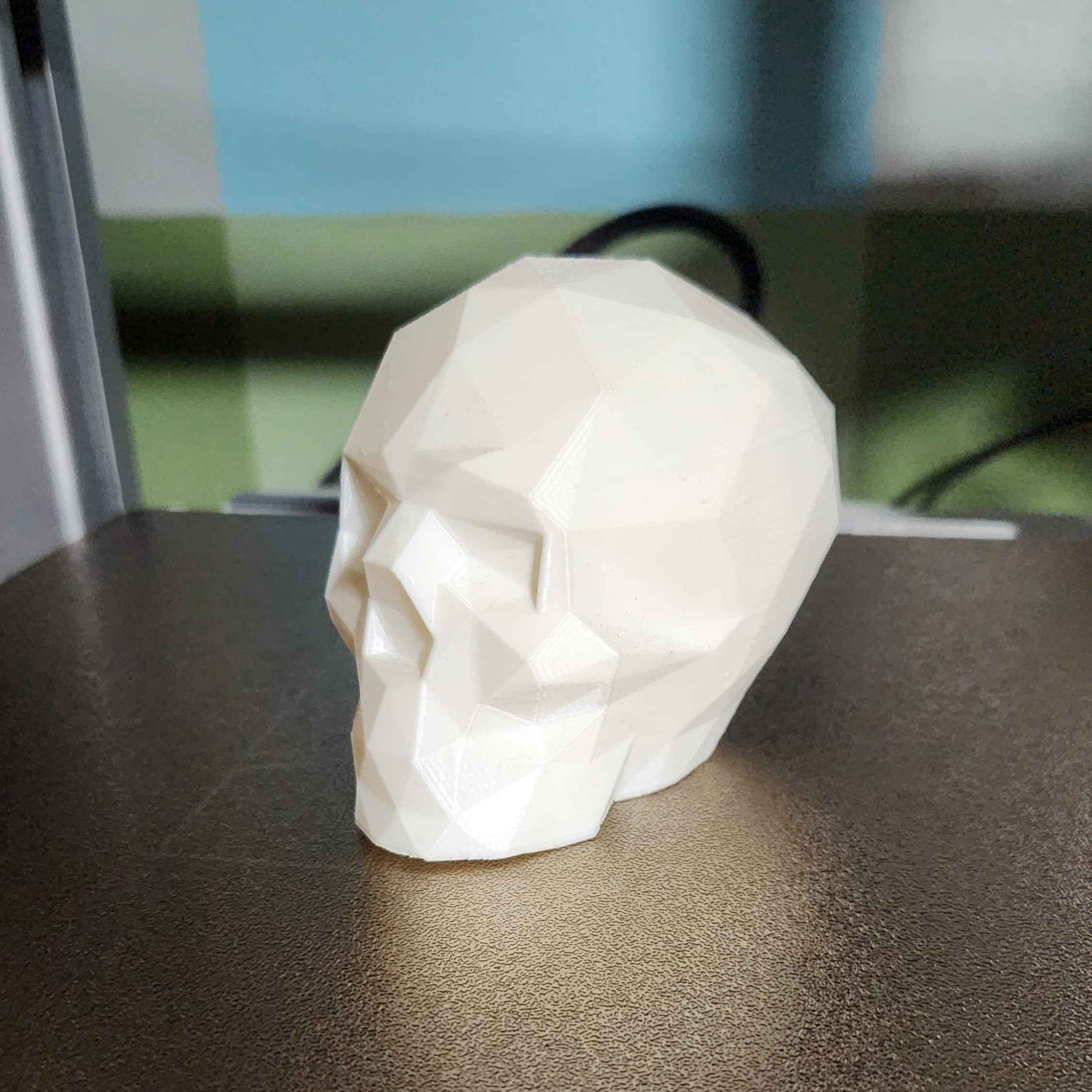 a low poly rendition of a human skull