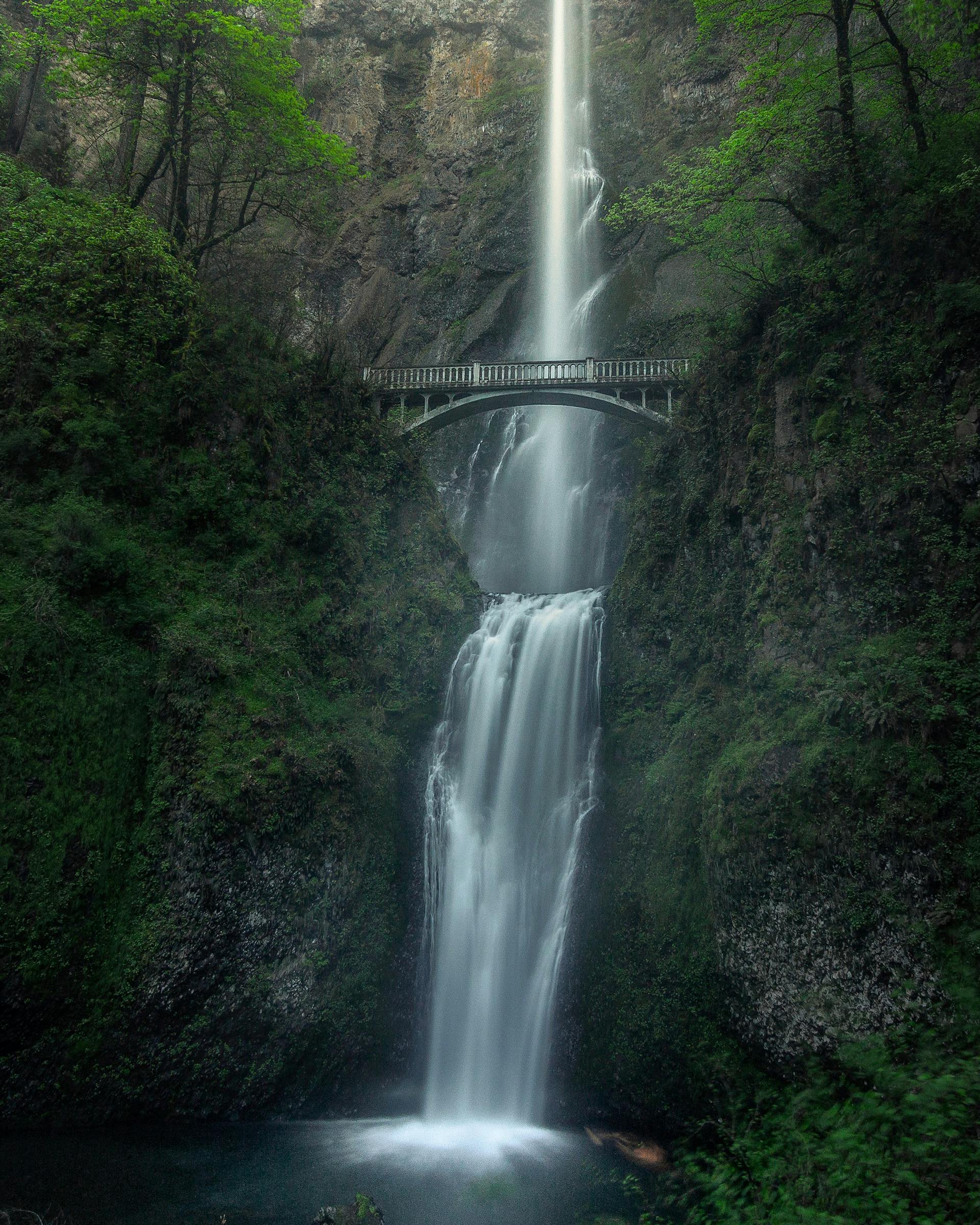 a photo of the Benson Bridge and a waterfall in the background